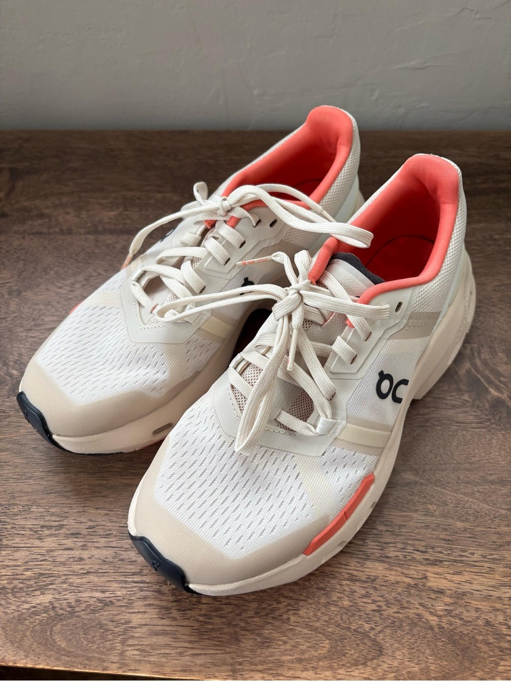 On Women's Cloudpulse Sneakers in Cream with Coral Lining